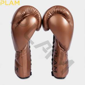 Guantes de boxeo profesionales de cuero vacuno con cordones para entrenamiento y combate. - Product Image 4