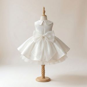 Vestido de niña de las flores minimalista color marfil de la marca Vendor Choice, con falda de satén hasta la rodilla, forro suave y transpirable, lazo llamativo y detalle de perlas. - Product Image 2