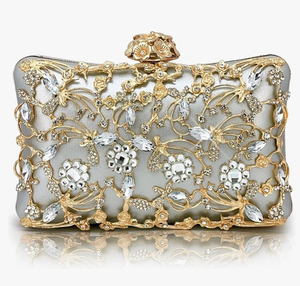 Elaborate <b>gold</b> ethnic clutch with emerald accents and a traditional red tassel handle. Grand, available at wholesale prices - Product Image 3