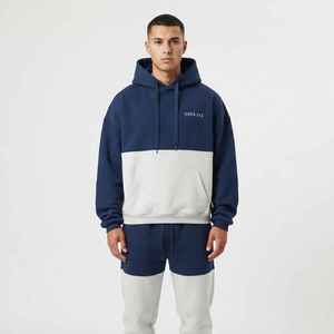 Survêtement à capuche pour homme avec blocs de couleur, cordon de serrage et poches, coupe décontractée ample, manches longues, idéal pour l'automne, 100 % coton - Product Image 1