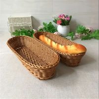 Organisateur de boulangerie panier ovale en rotin tissé à la main artisanat petite taille plateaux de service décoration rustique pour cuisine et restaurant