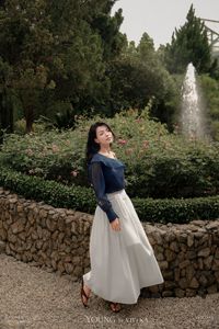 กระโปรงทรงเอเอวสูงสีขาวสำหรับผู้หญิง ผ้าชีฟองจีบพลิ้วสวยหรู ยาวระดับข้อเท้า พร้อมเข็มขัดผูก SABRINA - Product Image 4