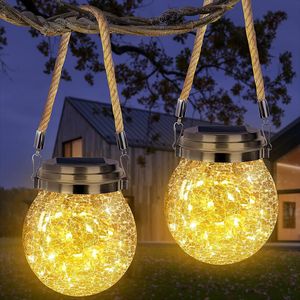 Set di 2 Lanterne Solari con Sfera di Vetro Effetto Craquelé, Impermeabili, Luci da Giardino Sospese con 30 LED Bianco Caldo per Decorazioni Esterne - Product Image 1