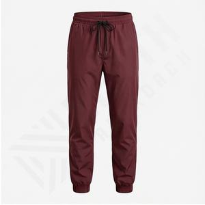 Pantalones impermeables de nailon con estampado de logotipo personalizado Popular de primavera, pantalones cortavientos de alta calidad para hombre, pantalones para correr con forro de malla - Product Image 2