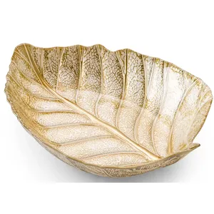 Premium Sculptural <b>Metal</b> Fruit <b>Bowl</b> with Asymmetric Organic Construction and Warm Brass Inspired FinishLeaf Shaped Ceramic Decor - Product Image 1