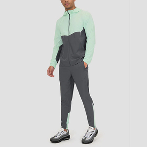 Conjunto de Chaqueta y Pantalones Cortavientos Unisex Impermeables y Transpirables de Color Sólido para Invierno, con Logotipo Frontal - Product Image 5