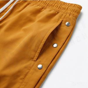 Pantalones Cortos Deportivos de Poliéster y Spandex con Logotipo Personalizado de Alta Calidad, Cortavientos de Nailon con Botones Laterales, Ropa Deportiva Transpirable Premium - Product Image 5