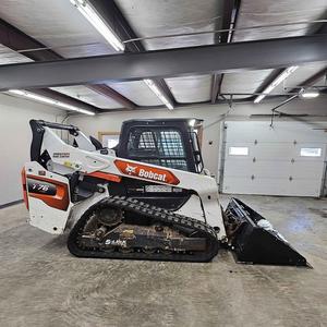 รถตักล้อยางดีเซล Bobcat T76 รุ่นใหม่ พร้อมรถขุดตักดิน รับประกัน 1 ปี; ชุดหลักประกอบด้วย มอเตอร์ เครื่องยนต์ เกียร์ แบริ่ง และปั๊ม - Product Image 3