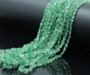 Perles en pierre émeraude naturelle de Zambie Forme ovale lisse 4*6-5*7MM Couleur et taille uniques - Product Image 3