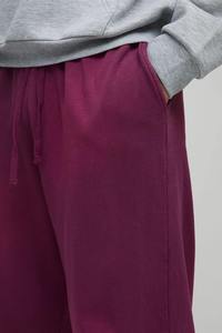 Nuevo Artículo: Pantalones Deportivos Casuales para Hombre, Color Borgoña, Cintura Elástica, con Logotipo de Llama Estampado en la Pierna Derecha, Transpirables, de Algodón Tejido, para Otoño - Product Image 5