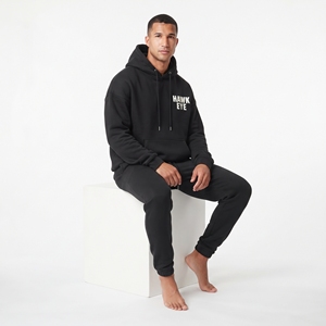 Ensemble de survêtement streetwear pour hommes en coton épais, comprenant un sweat à capuche oversize et un pantalon de jogging, couleur noir uni, vente en gros - Product Image 4