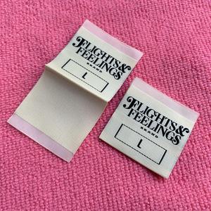 High Density Damask Woven Labels One Side Fold Laser Cut <b>Edge</b> Stitch Brand Logo Garment Labels for Coats Apparel TITAN TREAD - Product Image 3