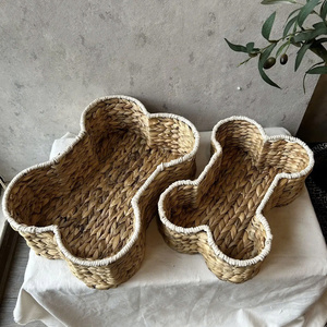 Juego de 2 cestas de almacenamiento con forma de hueso, cestas de almacenamiento tejidas de jacinto de agua para perros y gatos, hechas en Vietnam. - Product Image 1