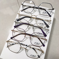 Inventaire de liquidation de montures de lunettes en métal de haute qualité, montures de lunettes optiques en gros mixtes pour hommes et femmes