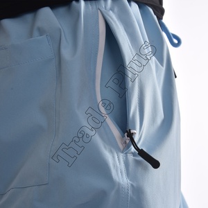 Pantalon de neige imperméable bleu clair de qualité supérieure avec taille à cordon de serrage, doublure chaude pour l'hiver, ourlet réglable et design ample - Product Image 4