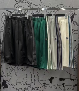 Shorts de sport pour homme en satin brodé de marque haut de gamme, color block cyan, noir, blanc, gris, légers, respirants et écologiques - Product Image 1