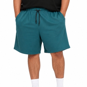 Shorts de détente pour hommes grandes tailles, confortables pour l'été, coupe décontractée, style moderne et décontracté, en coton doux et confortable. - Product Image 1