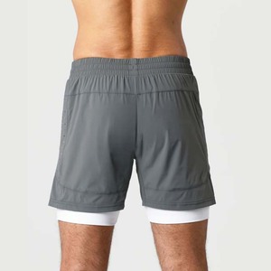 Shorts de sport gris uni pour homme, à séchage rapide, taille élastique, avec poches, taille mi-haute, en polyester tissé - Product Image 2
