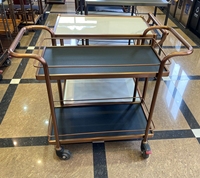 Chariot de service moderne en acier inoxydable à 4 roues pour spiritueux, vin, nourriture, et usage domestique, idéal pour hôtels, bars et salles à manger