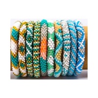 Bracelets en rouleau népal de haute qualité Bracelets perlés de couleur unie pour enfants en forme de boule pour les anniversaires