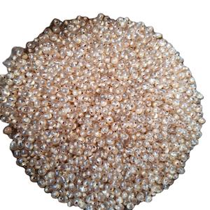 Vente en gros de perles de verre ovales uniques soufflées à la main en cristal beige élégant gracieusement fabriqué à la main - Product Image 1