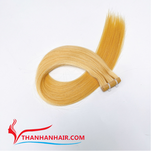 Venta al por mayor 100% Extensiones de cinta de cabello humano vietnamita crudo Sin desprendimiento Sin enredos Calidad súper sedosa - Product Image 5