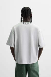 เสื้อยืดผู้ชายสีดำล้วนขนาดใหญ่พิเศษ 400 GSM สั่งทำโลโก้ได้ ผ้าฝ้าย 100% สไตล์ลำลอง ผ้าถัก พิมพ์ลายดิจิตอล ป้องกันขนร่วง - Product Image 3