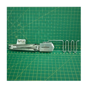 Carpeta y carpeta de piezas para máquinas de coser industriales de 1/4 ", hecha en Taiwán para uso en prendas de vestir - Product Image 1