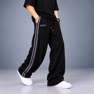 Pantalon de survêtement ample à jambes larges pour homme, avec bande latérale personnalisée, coupe décontractée, style streetwear, taille à cordon de serrage, fabricant de vêtements sur mesure - Product Image 1