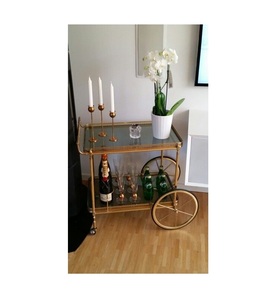 2 Tier Vintage Brass Bar Cart with Large Spoke Wheels Antique Gold Metal <b>Serving</b> <b>Trolley</b> with Mirrored Shelves - Product Image 1