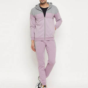 Le survêtement pour homme offre un look athlétique simple et élégant, idéal pour l'entraînement physique, la course à pied et les sorties décontractées. - Product Image 1