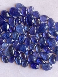 พลอยแทนซาไนต์ธรรมชาติทรงหลังเบี้ย คละรูปทรงและขนาด คุณภาพเกรด AAA ความเงางามเกรด AAA สีสวยงาม เหมาะสำหรับทำเครื่องประดับทุกชนิด ในราคาประหยัด - Product Image 3