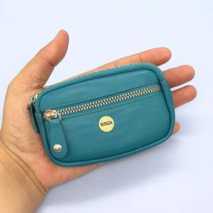 Élégante mini pochette WRIZA en cuir véritable bleu sarcelle avec fermeture éclair, poche avant, sangle à bouton-pression, portable et durable pour le rangement quotidien de pièces de monnaie, cartes et clés - Product Image 5