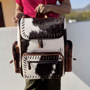 กระเป๋าเป้หนังวัวลายตะวันตก ขนสัตว์แท้ ดีไซน์เก๋ ทันสมัย เหมาะสำหรับนักเรียน  กระเป๋าเป้สะพายหลังแบบ unisex  กระเป๋าดีไซน์เนอร์สุดพิเศษ - Product Image 1