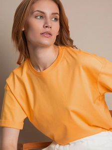 เสื้อยืดคอกลมโอเวอร์ไซส์สำหรับผู้หญิง สีเหลือง แขนสั้น ทรงหลวม ผ้าฝ้ายเจอร์ซีย์ถัก 100% สีพื้น ใส่ได้ทุกฤดู - Product Image 2