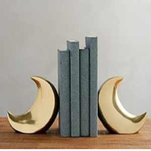Sujetalibros modernos minimalistas con forma de luna creciente dorada, una adición celestial para cualquier hogar contemporáneo; disponibles a precios de mayorista. - Product Image 1