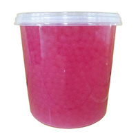 Garniture de thé à bulles à saveur de raisin avec des ingrédients Boba éclatants et du tapioca emballés dans une boîte