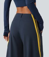 Pantalon de danse sportif taille haute pour femme, coupe élégante, blocs de couleur, rayures latérales, jambe large, poches plaquées