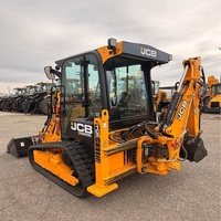 Chargeuse-pelleteuse JCB 1CX conçue pour les entrepreneurs cherchant des travaux d'excavation et de chargement à haute efficacité en milieu urbain