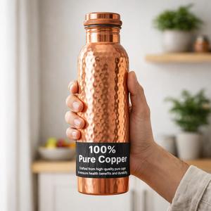 Botella de Agua Portátil de Cobre Puro con Diseño Martillado de 750 ml, con Tapa de Rosca, para Viajes, Oficina, Campamento y Fiestas - Product Image 1