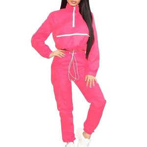 Conjunto Deportivo Personalizado Unisex de 2 Piezas, Chaqueta Deportiva con Cierre y Pantalones de Nylon, Traje Deportivo Cortavientos para Hombre y Mujer - Product Image 1