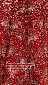 Fournisseur de tenues traditionnelles indiennes de haute qualité, en tissu résille lourd avec des fleurs, des paillettes et des broderies Zari, comprenant un Lehenga-Choli et un ensemble Dupatta, de Surat. - Product Image 6