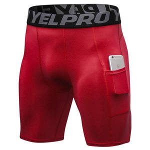 Shorts de compression rouges pour hommes avec poche latérale, séchage rapide, coupe sportive, taille élastique, longueur mi-cuisse, en Spandex et Polyester - Product Image 1