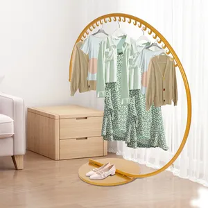 Minimalist Round Metal Clothing <b>Rack</b> with Rotating Design for Dresses Standing Type Space Saving Organizer 100x70CM - Product Image 1