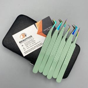 Pince à épiler professionnelle en acier inoxydable avec logo personnalisé Nouveaux embouts en fibre pour l'extension de cils volumineux - Product Image 5