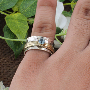 Shree Jaipur Silver Natural Blue Topaz Bezel Set Classic <b>Spinner</b> <b>Ring</b> 925 Sterling Silver Hammered Band Two-Tone Gold Accent - Product Image 2