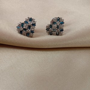 1.06 Cttw White & Blue Diamond Stud Earrings 925 Sterling Silver, Round & Baguette Cut Natural & Color-Enhanced Diamond Earrings - Product Image 1