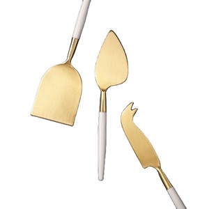 ที่มีคุณภาพที่ดีที่สุดสแตนเลสมีดชีสชุดชุบทองที่มีสีขาวเคลือบจับที่มีคุณภาพพรีเมี่ยมที่กำหนดเองสำหรับร้านอาหาร - Product Image 1