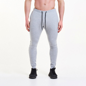 Pantalon de survêtement pour homme en coton 100% respirant et écologique, coupe droite, taille haute, couleur unie, pour usage décontracté - Product Image 1