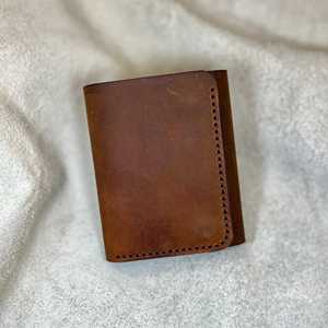 กระเป๋าสตางค์หนังแท้ผู้ชายแบบสามพับ พร้อมช่องใส่เหรียญ ป้องกัน RFID  ใส่บัตรเครดิตได้ สั่งทำโลโก้ได้ ขายส่ง NTW-0086B - Product Image 2